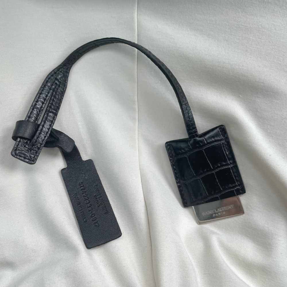 Authentic Saint laurent embossed black leather luggage tag